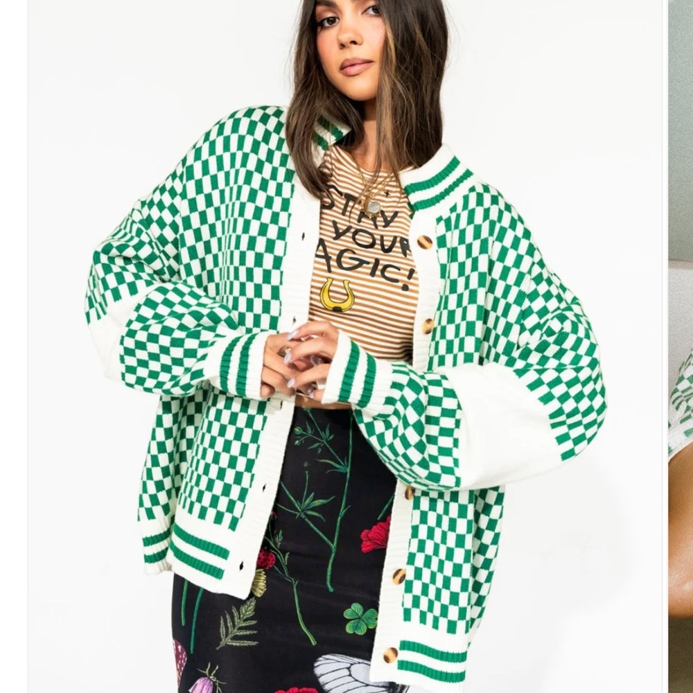 Dressed in lala cardigan. Never worn. Small/medium